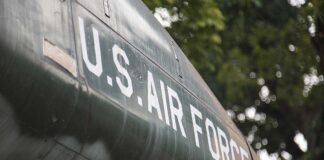 U.S. Air Force plane with trees in background.