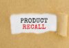 Text "Product Recall" on torn brown paper.