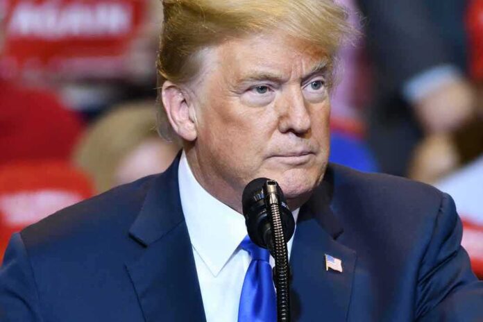 1177917220 featured image Man speaking at a rally in blue suit