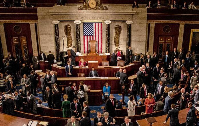 1186368265 featured image People gathering inside a government building legislative chamber