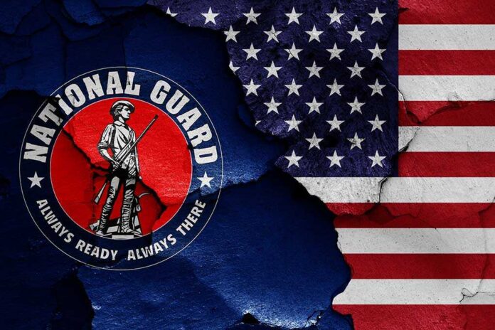1787937674 featured image National Guard logo over a distressed American flag.