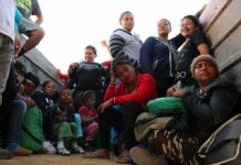 Group of people sitting in a truck
