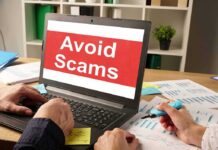 Laptop displaying avoid scams message on screen