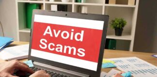 Laptop displaying avoid scams message on screen