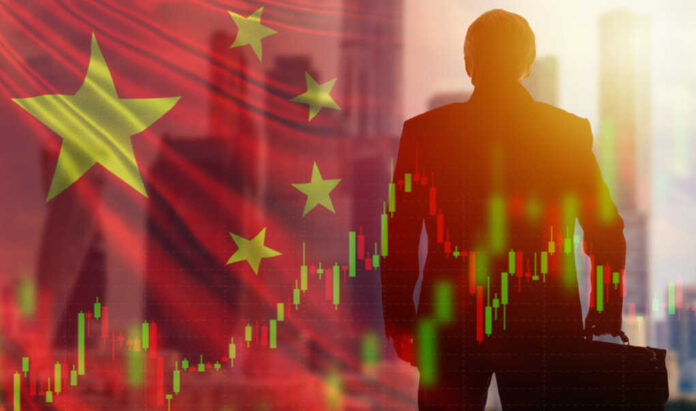 2006995388 featured image Man with chart and China flag background