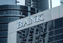 Modern bank building with reflective glass exterior