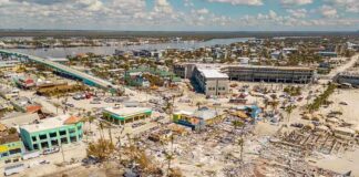 Aerial view of hurricane-damaged buildings and debris