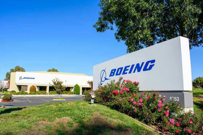 2409733907 Boeing office building with signage and landscaping