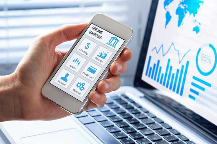 599904188 Person using smartphone for online banking