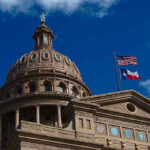 Texas Political Bombshell: Democrats CRUSHED Building dome with US and Texas flags, blue sky.