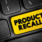 110,000 Units Recalled – Fire Risk Black keyboard with Product Recall yellow key.