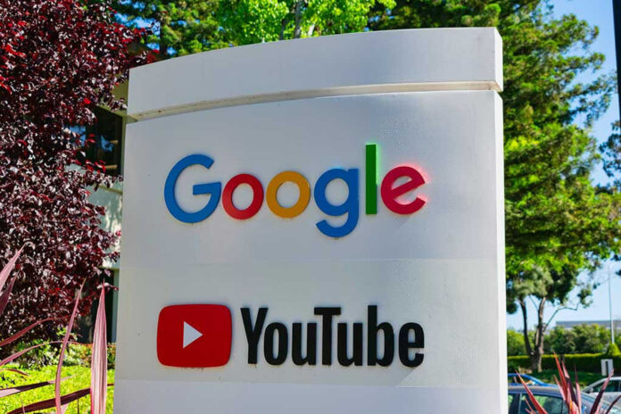 Google and YouTube sign with trees in background