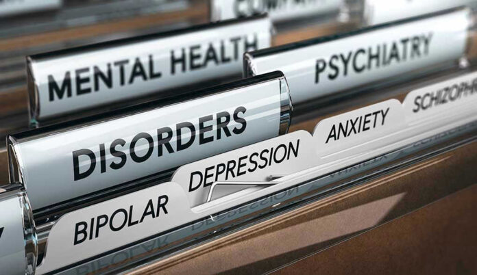 File folders labeled with mental health disorders and psychiatry