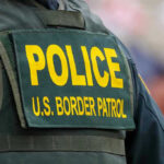 Police U.S. Border Patrol uniform close-up.