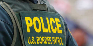 Police U.S. Border Patrol uniform close-up.