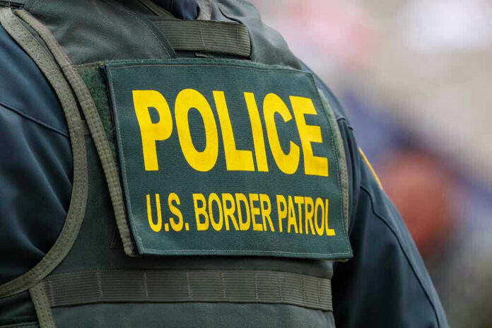 Police U.S. Border Patrol uniform close-up.