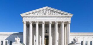 Map Redraw Could Hand GOP DOZEN More Seats The Supreme Court building featuring marble columns and a clear blue sky