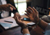 Man ARRESTED – Psychiatrist’s Cafe Diagnosis Controversy Person handcuffed in discussion with another person