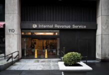 Entrance of the Internal Revenue Service office with signage