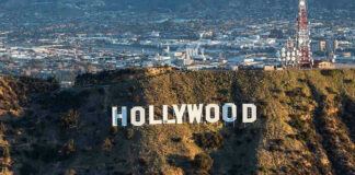 The Hollywood sign on a hillside.