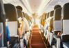 Airplane Passengers Toenails Spark Outrage! Passengers seated inside an airplane cabin.
