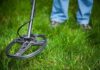 Forgotten WW2 Bomb OBLITERATES Village! A metal detector being used on grassy ground