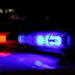 NBA Arrested At MIDNIGHT During NBA Finals Week! Close-up of police lights flashing in blue and red at night