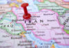 Mamdani Schedules SECRET Meeting With Iran Leaders! Red pushpin marking Iran on a map.