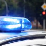 Police car blue siren light flashing