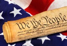 DSA Vow To SHRED Declaration of Independence Rolled U.S. Constitution on an American flag