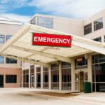 Emergency Rooms a Disaster – 12 Hour Wait Times Emergency room entrance at a modern hospital