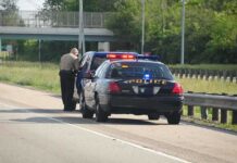 Dem Lawmaker Claims Immunity Over 100 MPH Stop Police officer conducting a traffic stop on a highway