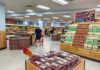 Groceries About To Cost MORE After Latest Bill Passed Interior of a grocery store with customers shopping for fresh produce