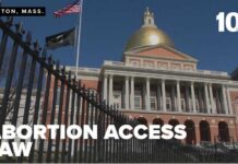 Healey signs Massachusetts law expanding abortion access after 24 weeks