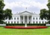 The White House with fountain and red flower bed