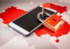 Smartphone with padlock and small flag on map of China
