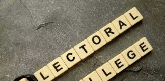 Governor’s Bombshell: Scrap Electoral College Letter tiles spelling electoral college on a gray surface