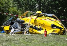 News Chopper Plunges Into Street Mid-Report yellow helicopter crash scene on grassy field
