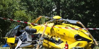 News Chopper Plunges Into Street Mid-Report yellow helicopter crash scene on grassy field