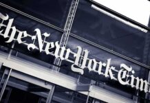 NYT Exec SHOT By Crazed In-Laws! The New York Times sign on a glass building facade