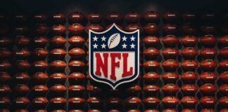Mariachi Band’s National Anthem at NFL Game Ignites Racism Debate NFL shield logo over wall of footballs