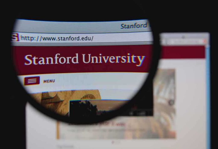 shutterstock_172997678 Close-up view of Stanford Universitys website through a magnifying glass