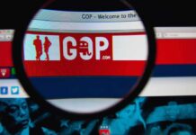 Nazi Symbol Clip Torches Rising GOP Aide Magnifying glass focusing on GOP website banner