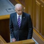 Biden Blunders His Way Through Abortion Award Joe Biden standing in a wood-paneled chamber in a dark suit