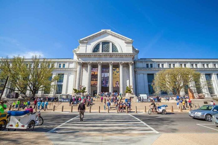 Neoclassical museum building with columns and busy entrance