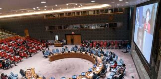 Dem Wants Iran Nukes – Ignites Media Firestorm Delegates seated around a circular conference table in a large chamber