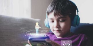 Boy with headphones using a smartphone with holographic chatbot icons