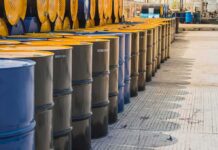 Saudis Reveals Oil Levels Are ‘SCARILY THIN’ Rows of industrial metal barrels with yellow lids
