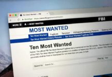 Trump’s Assassin Was Texting Unknown Persons Before Attack Computer screen showing an FBI Most Wanted webpage