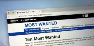 Computer screen showing an FBI Most Wanted webpage